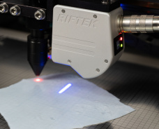Laser System for Biological Tissue Thickness Measurement and Cutting
